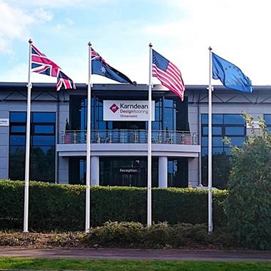 fibreglass flagpoles with hinged bases at a show