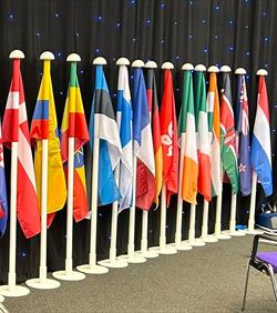 Premium Indoor Flagpoles and elegant ceremonial flags on display