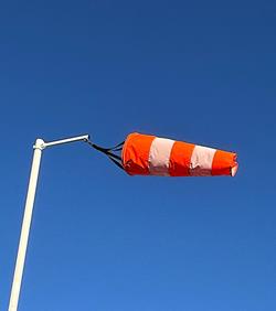 orange and white windsock flying