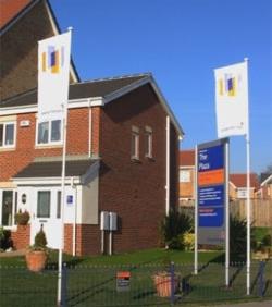 premier show home flagpoles on display