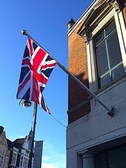fibreglass flagpole wall mounted with a Union Jack flying in London