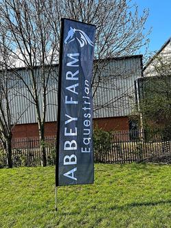 Flying banner flag in filed