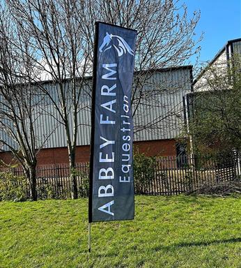 Flying banner flag in filed