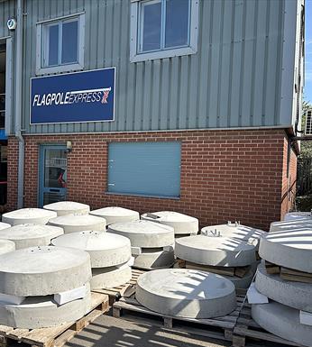 flagpole with free standing concrete base