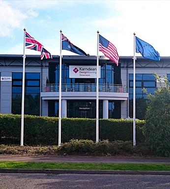 fibreglass flagpoles with hinged bases with volvo flags flying